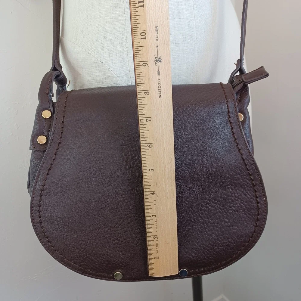 Charming Charlie Brown Pebbled Vegan Leather Saddle Crossbody Bag Whipstitch